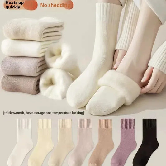 Stack of socks and a person wearing white socks with text about heating and shedding.